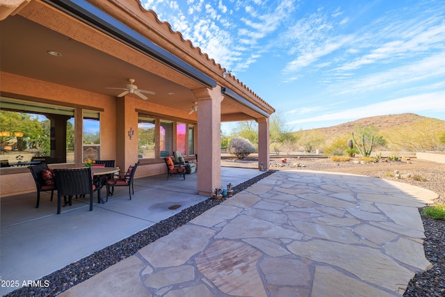13050 W Pinnacle Vista Dr, Peoria, AZ 85383 - view of patio / terrace featuring a mountain view and ceiling fan