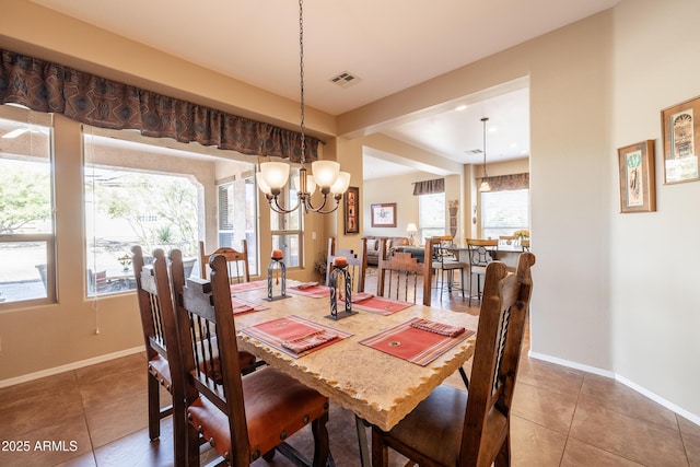 13050 W Pinnacle Vista Dr, Peoria, AZ 85383 - dining room with tile patterned flooring and a chandelier