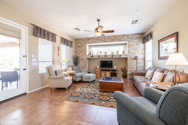 13050 W Pinnacle Vista Dr, Peoria, AZ 85383 - living room featuring ceiling fan and tile patterned floors