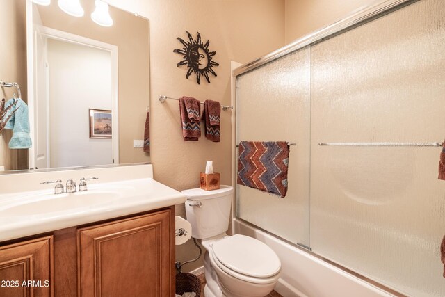 13050 W Pinnacle Vista Dr, Peoria, AZ 85383 - full bathroom with toilet, vanity, and bath / shower combo with glass door