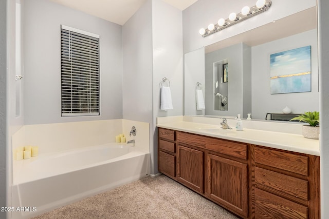 bathroom featuring carpet, a bath, and vanity