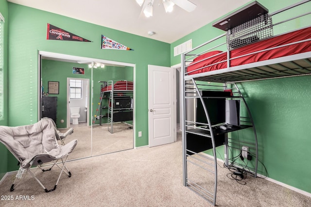 unfurnished bedroom featuring visible vents, baseboards, ceiling fan, and carpet flooring