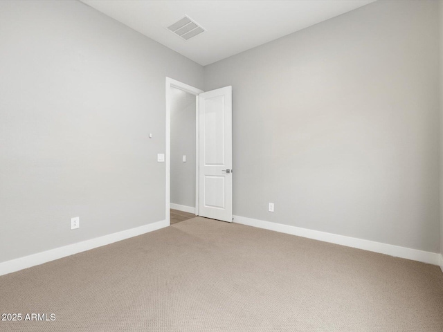 17621 W Pierson St, Goodyear, AZ 85395 - empty room featuring light colored carpet and baseboards