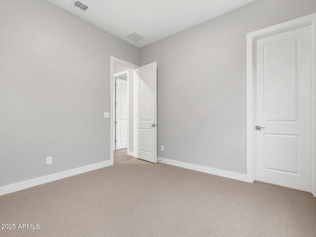 17621 W Pierson St, Goodyear, AZ 85395 - unfurnished bedroom featuring light carpet and baseboards