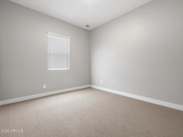 17621 W Pierson St, Goodyear, AZ 85395 - carpeted spare room featuring baseboards