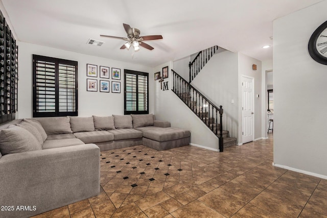9350 W Williams St, Tolleson, AZ 85353 - living area with ceiling fan, stairway, and recessed lighting