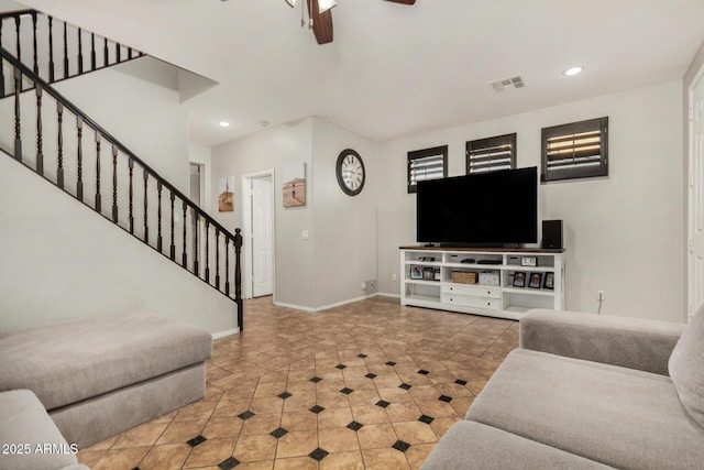 9350 W Williams St, Tolleson, AZ 85353 - tiled living room with stairs, a ceiling fan, and recessed lighting