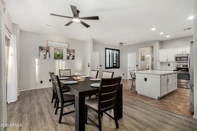 9350 W Williams St, Tolleson, AZ 85353 - dining room featuring ceiling fan, wood finished floors, and recessed lighting