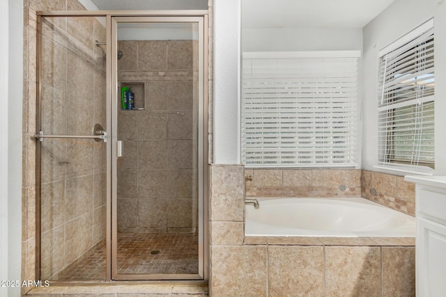 9350 W Williams St, Tolleson, AZ 85353 - full bathroom featuring a garden tub and a shower stall