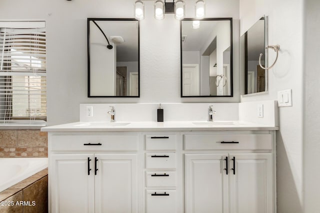 9350 W Williams St, Tolleson, AZ 85353 - full bathroom featuring double vanity and tiled bath