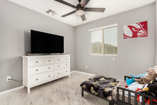 9350 W Williams St, Tolleson, AZ 85353 - bedroom featuring a ceiling fan and light marble finish floors