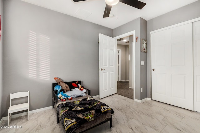 9350 W Williams St, Tolleson, AZ 85353 - bedroom with light marble finish floors and a ceiling fan
