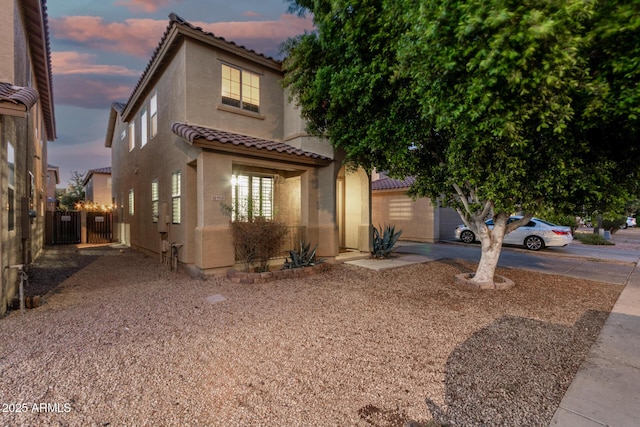 9350 W Williams St, Tolleson, AZ 85353 - view of front of home featuring a tile roof and stucco siding