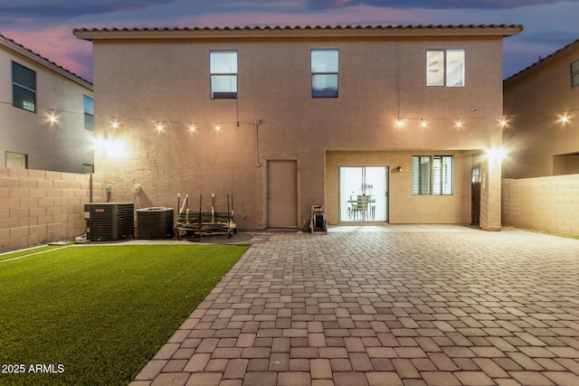 9350 W Williams St, Tolleson, AZ 85353 - rear view of property featuring a patio area and stucco siding