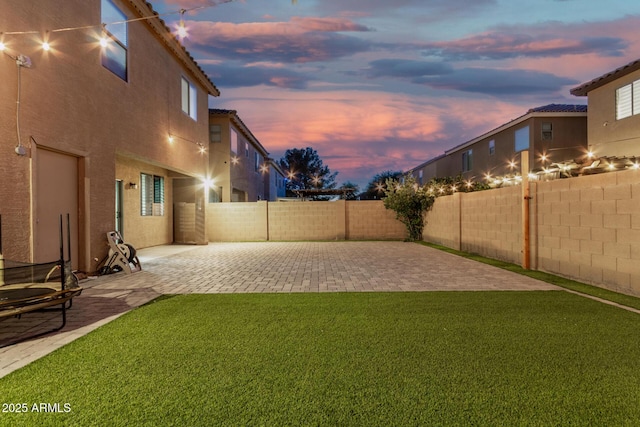 9350 W Williams St, Tolleson, AZ 85353 - fenced backyard featuring a patio area