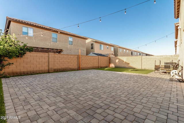 9350 W Williams St, Tolleson, AZ 85353 - fenced backyard with a patio area