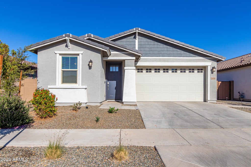 view of front of property featuring a garage