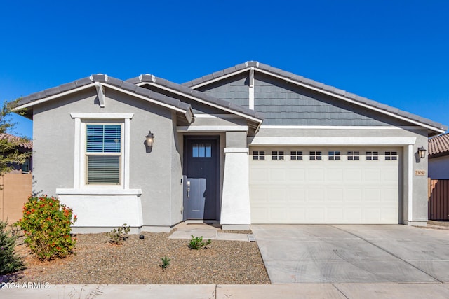 view of front of house with a garage