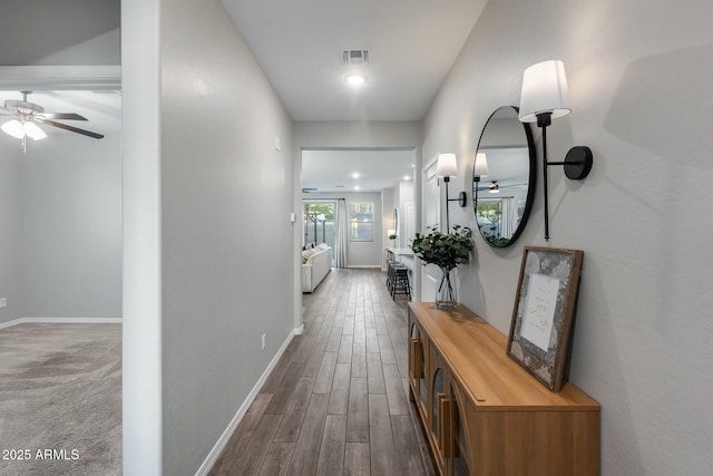 corridor featuring french doors and dark wood-type flooring