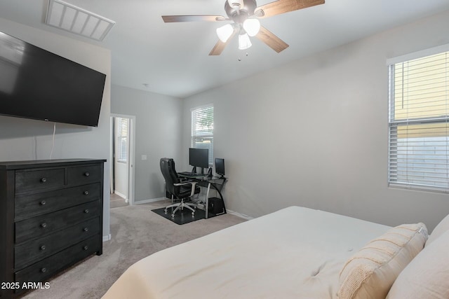 bedroom with light colored carpet and ceiling fan