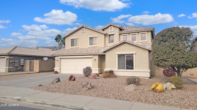 front of property with a garage