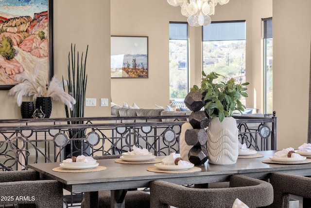 dining area featuring an inviting chandelier