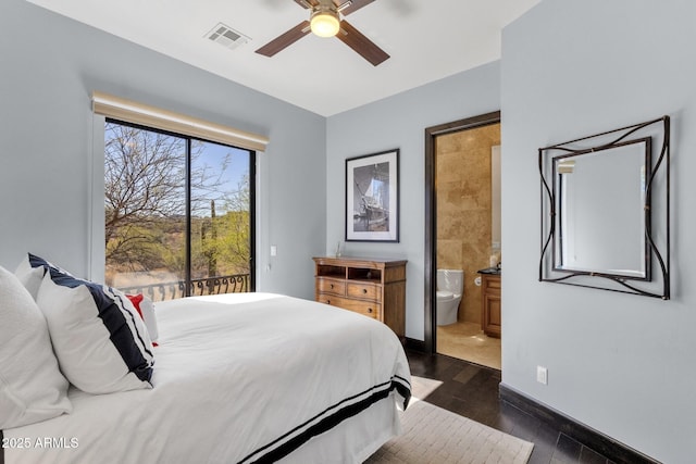 bedroom featuring baseboards, visible vents, ensuite bath, dark wood-style flooring, and access to exterior