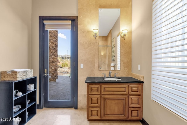 bathroom featuring vanity and tile patterned flooring