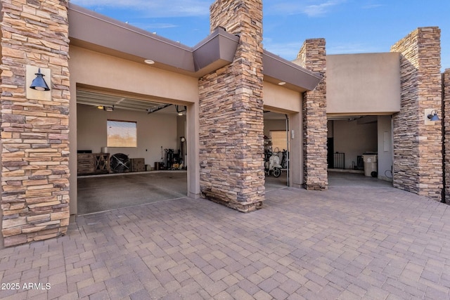 view of patio / terrace featuring an attached garage