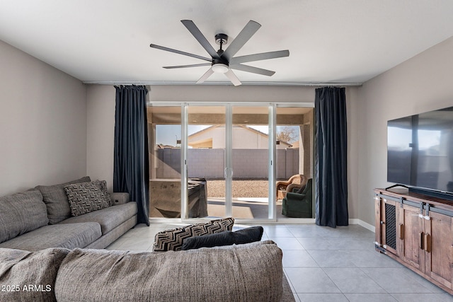 living room featuring ceiling fan and light tile patterned floors