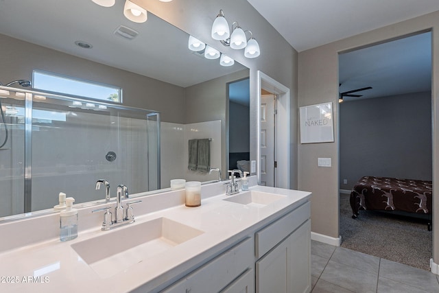 bathroom with vanity, tile patterned floors, ceiling fan, and a shower with shower door