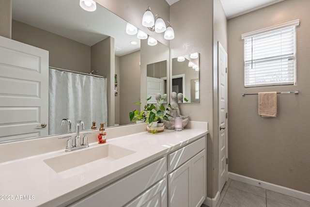 bathroom featuring tile patterned floors and vanity