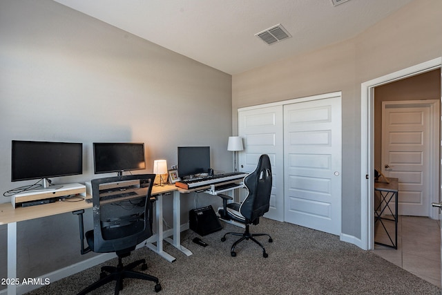 office space featuring light carpet