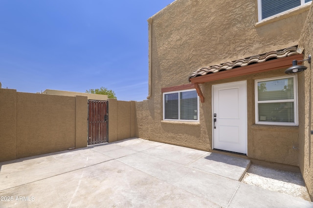 948 S Alma School Rd Unit 1, Mesa, AZ 85210 - view of patio featuring a gate