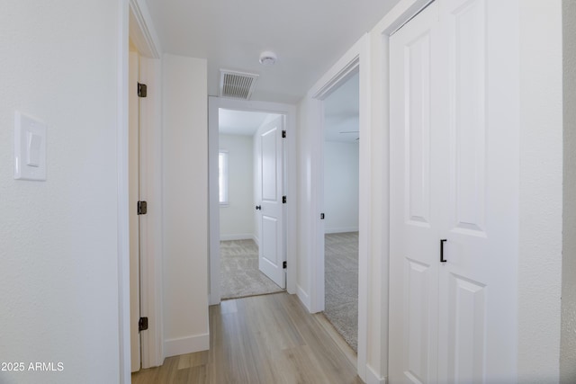 948 S Alma School Rd Unit 1, Mesa, AZ 85210 - corridor with light wood-type flooring and baseboards