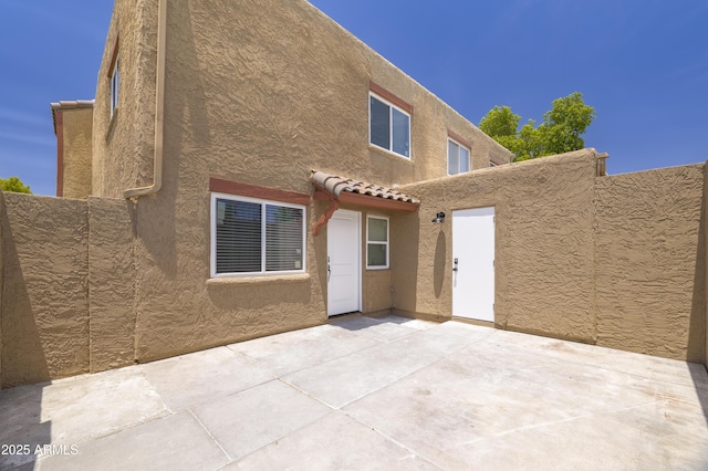 948 S Alma School Rd Unit 1, Mesa, AZ 85210 - rear view of house with a patio and stucco siding