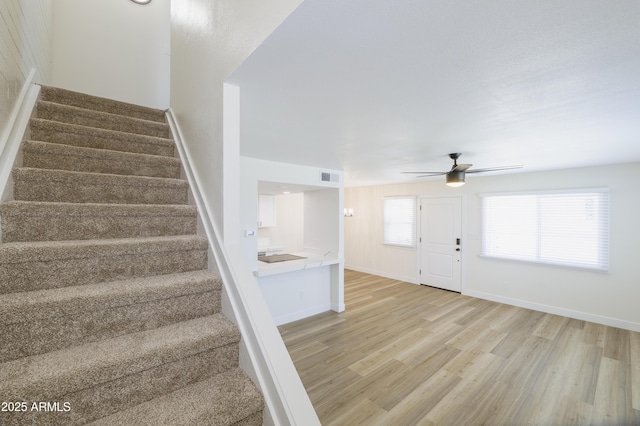 948 S Alma School Rd Unit 1, Mesa, AZ 85210 - staircase with wood finished floors and ceiling fan