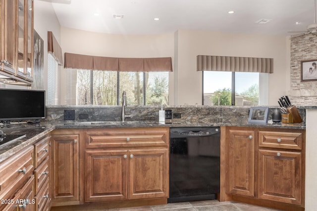 kitchen featuring glass insert cabinets, brown cabinetry, and dishwasher