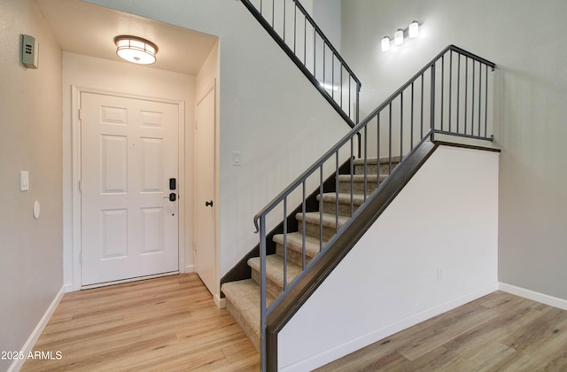 foyer entrance featuring light hardwood / wood-style flooring