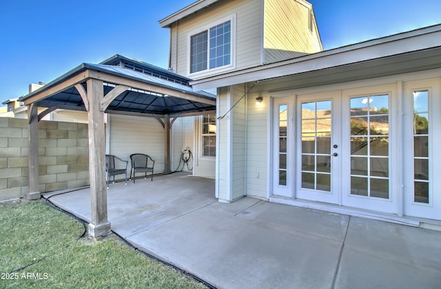 view of patio / terrace featuring french doors and a gazebo