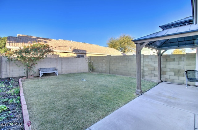 view of yard with a gazebo and a patio area