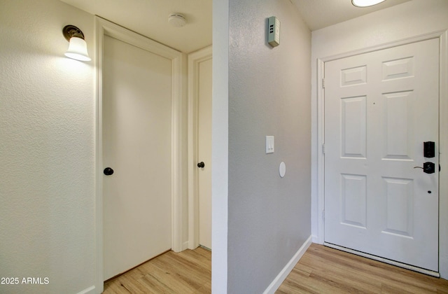 hall featuring light hardwood / wood-style flooring