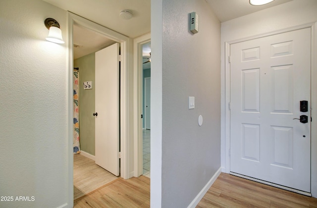 hall featuring light hardwood / wood-style flooring