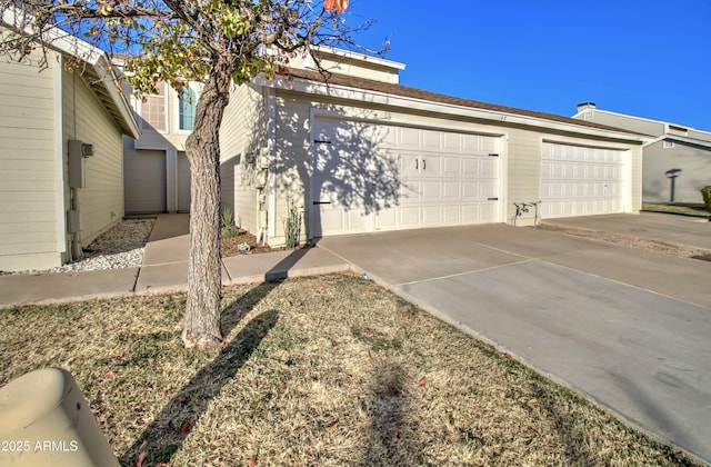 view of side of property featuring a garage