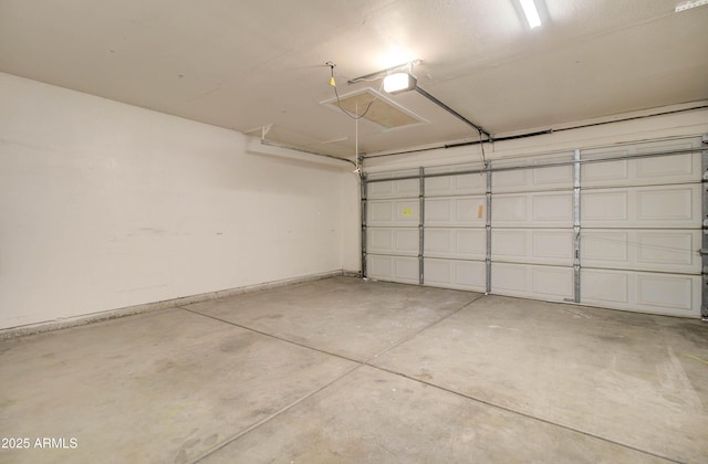 garage featuring a garage door opener