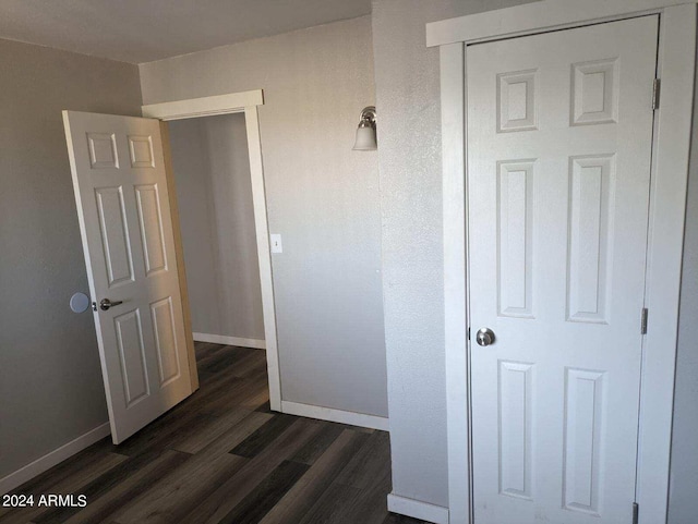 hall featuring dark hardwood / wood-style floors