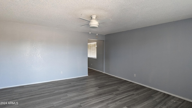 spare room with a textured ceiling, dark hardwood / wood-style floors, and ceiling fan