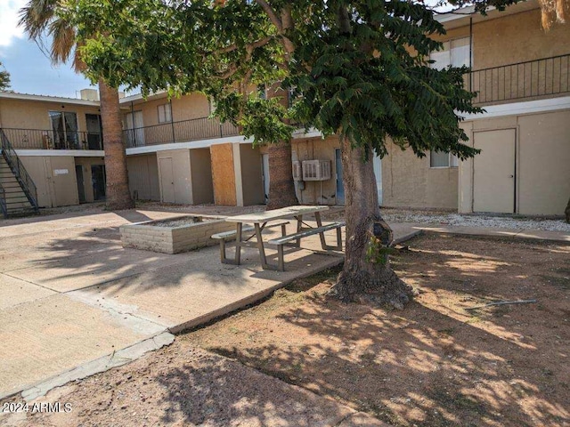 view of home's community featuring a patio area