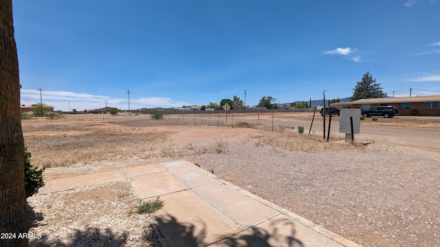 view of yard featuring a rural view