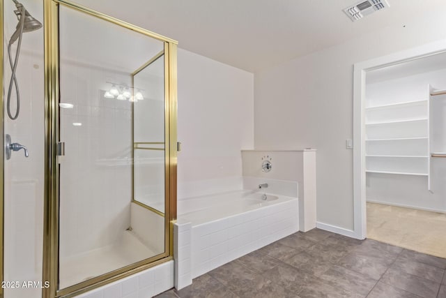 bathroom with separate shower and tub